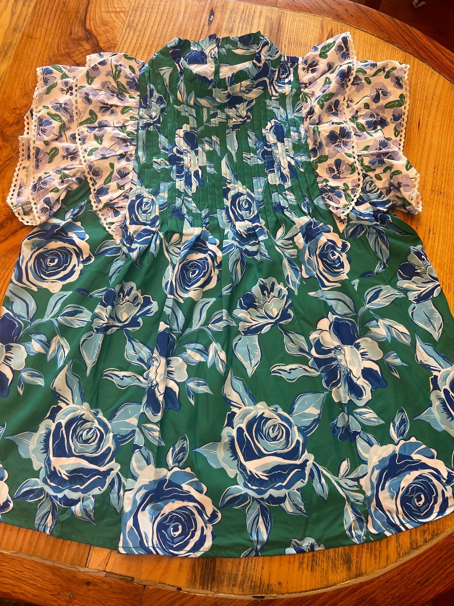 Green floral blouse